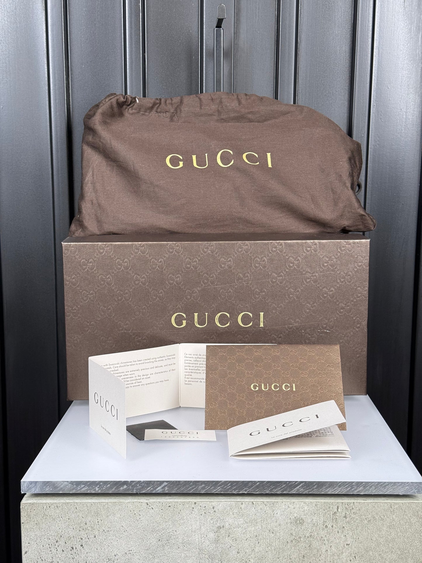 GUCCI Swarovski crystal logo clutch