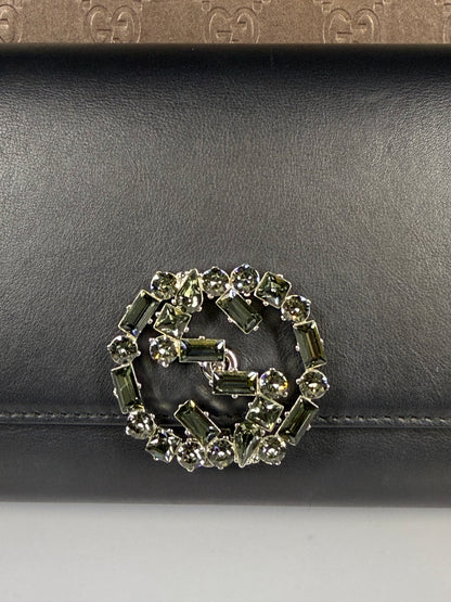GUCCI Swarovski crystal logo clutch