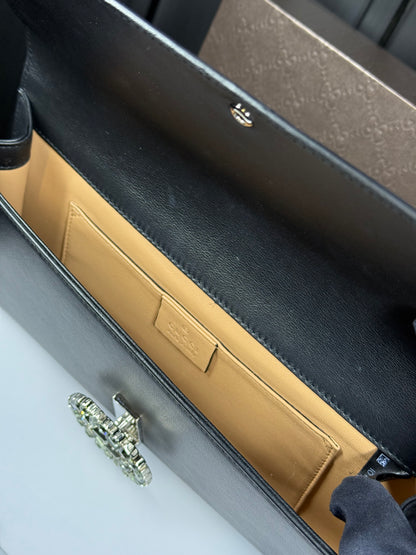 GUCCI Swarovski crystal logo clutch